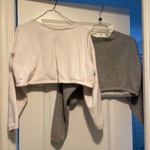 Two super cropped sweatshirts. Good for working out, in good condition.